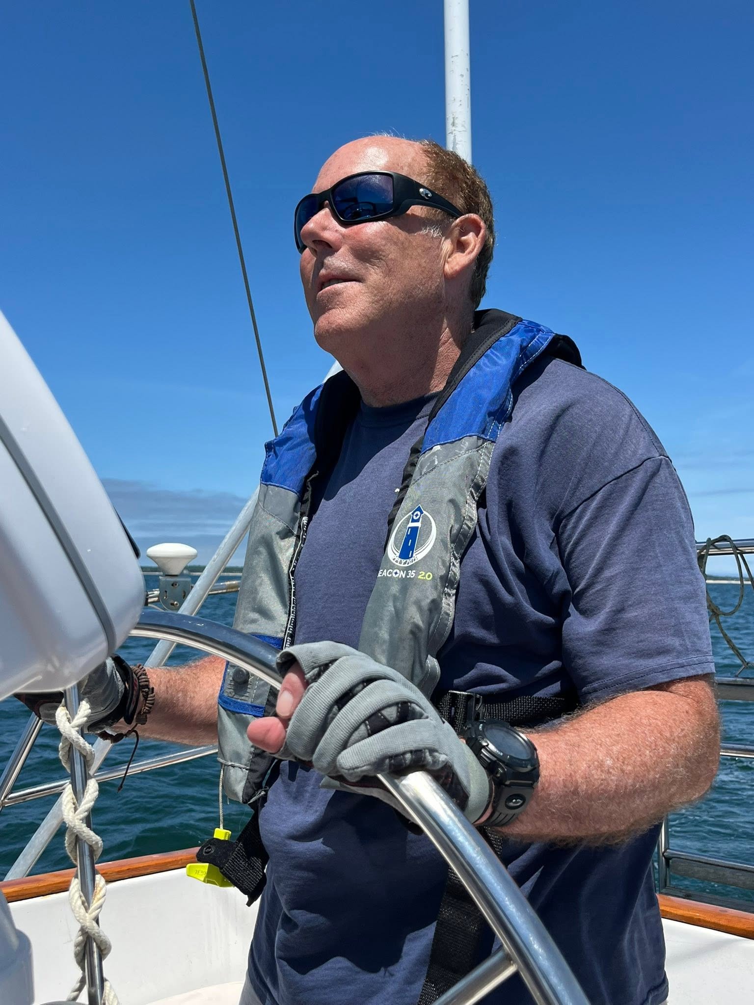 James F. Aspell at the helm off the Connecticut coast