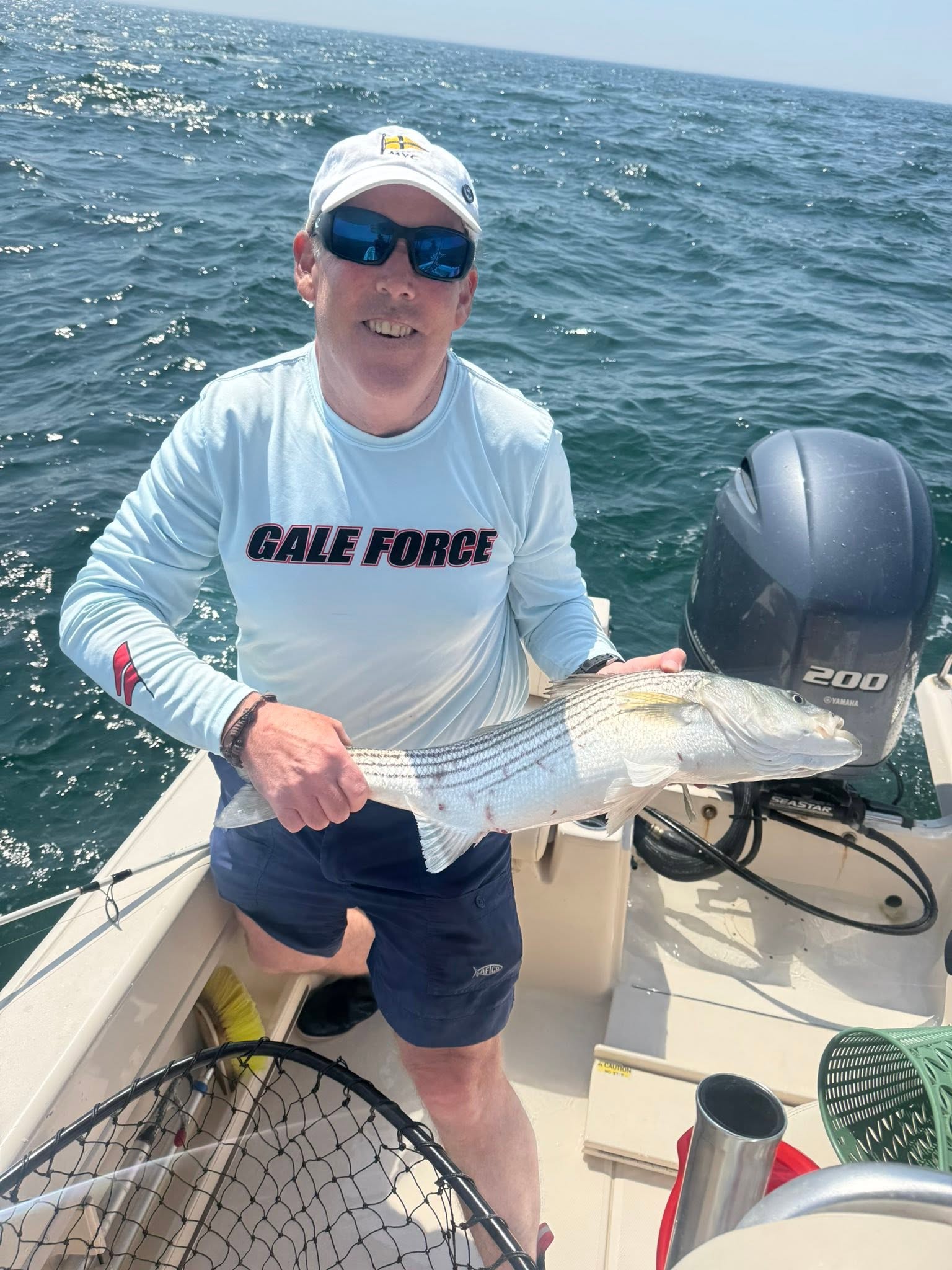 James Aspell with a striped bass